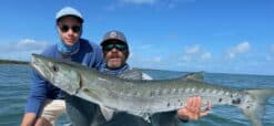 Key Biscayne fishing guide with the big barracuda caught during Miami fishing trip.